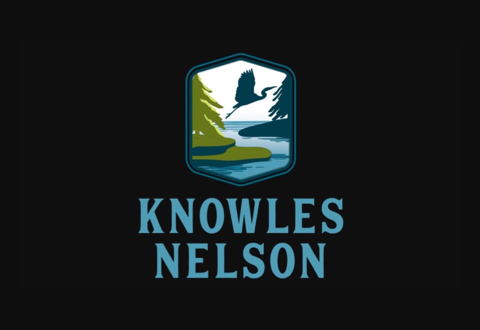 The Knowles Nelson color logo on a black background.