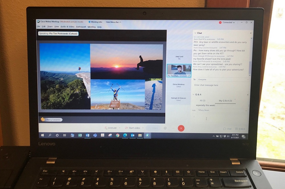 A laptop screen showing pictures of outdoor scenes.