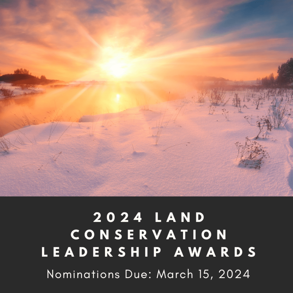 Sunset over a snowy landscape with text promoting the 2024 Land Conservation Leadership Awards.