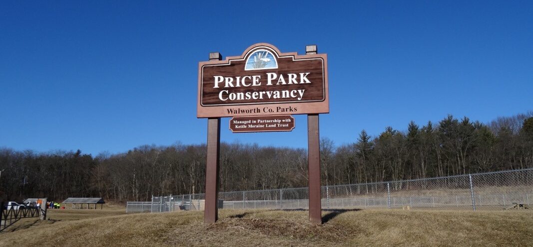 Brown park sign for Price Park Conservancy.