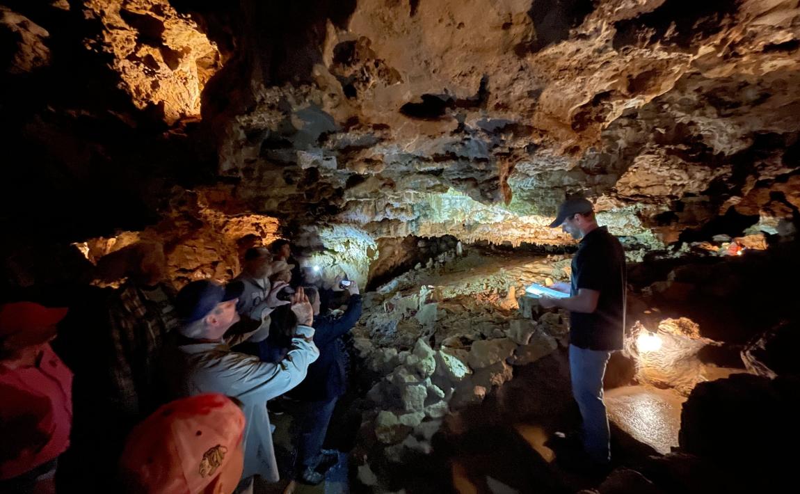 Participants tour the Kickapoo Caverns cave system during a 2023 Mississippi Valley Conservancy tour.